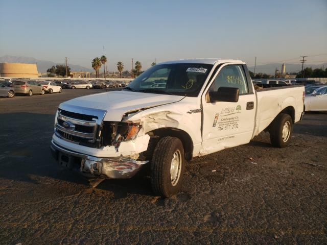 Photo 1 VIN: 1FTNF1CF2EKD63552 - FORD F150 