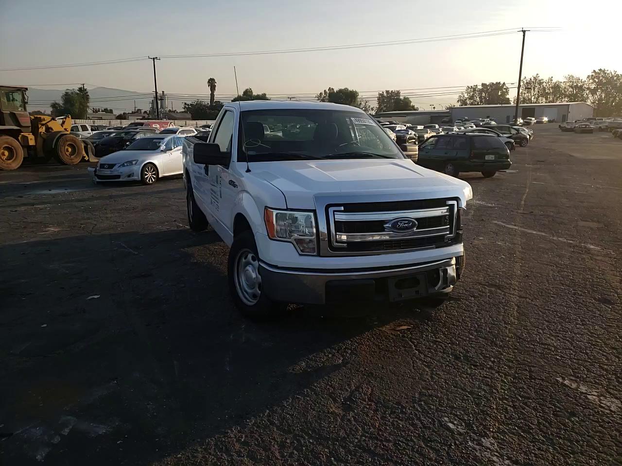 Photo 10 VIN: 1FTNF1CF2EKD63552 - FORD F150 