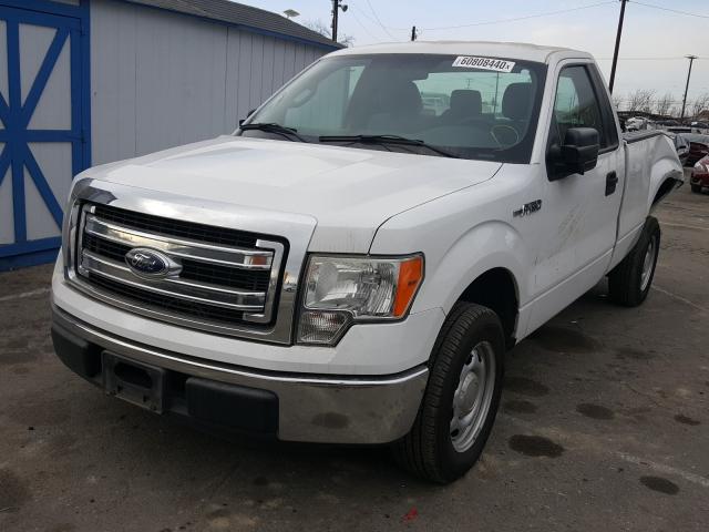 Photo 1 VIN: 1FTNF1CF3EKD17373 - FORD F150 