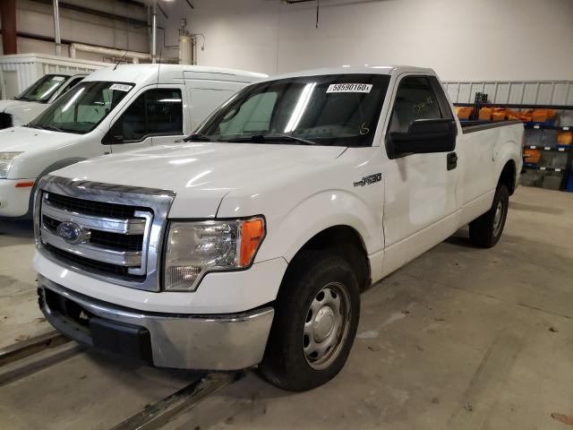 Photo 1 VIN: 1FTNF1CF4EKD64248 - FORD F150 