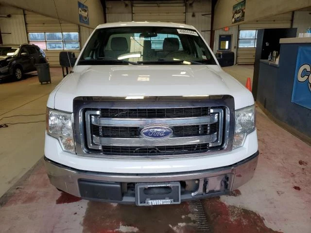 Photo 4 VIN: 1FTNF1CF7EKD64096 - FORD F150 