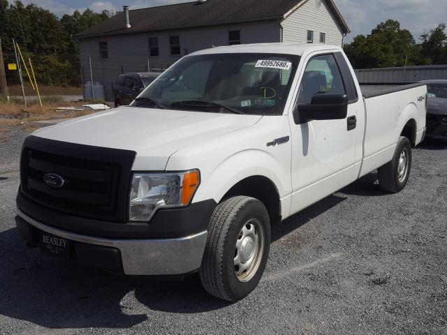 Photo 1 VIN: 1FTNF1EF4EKF14159 - FORD F150 