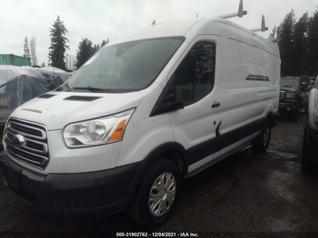 Photo 1 VIN: 1FTNR2CG9FKA02097 - FORD TRANSIT CARGO VAN 