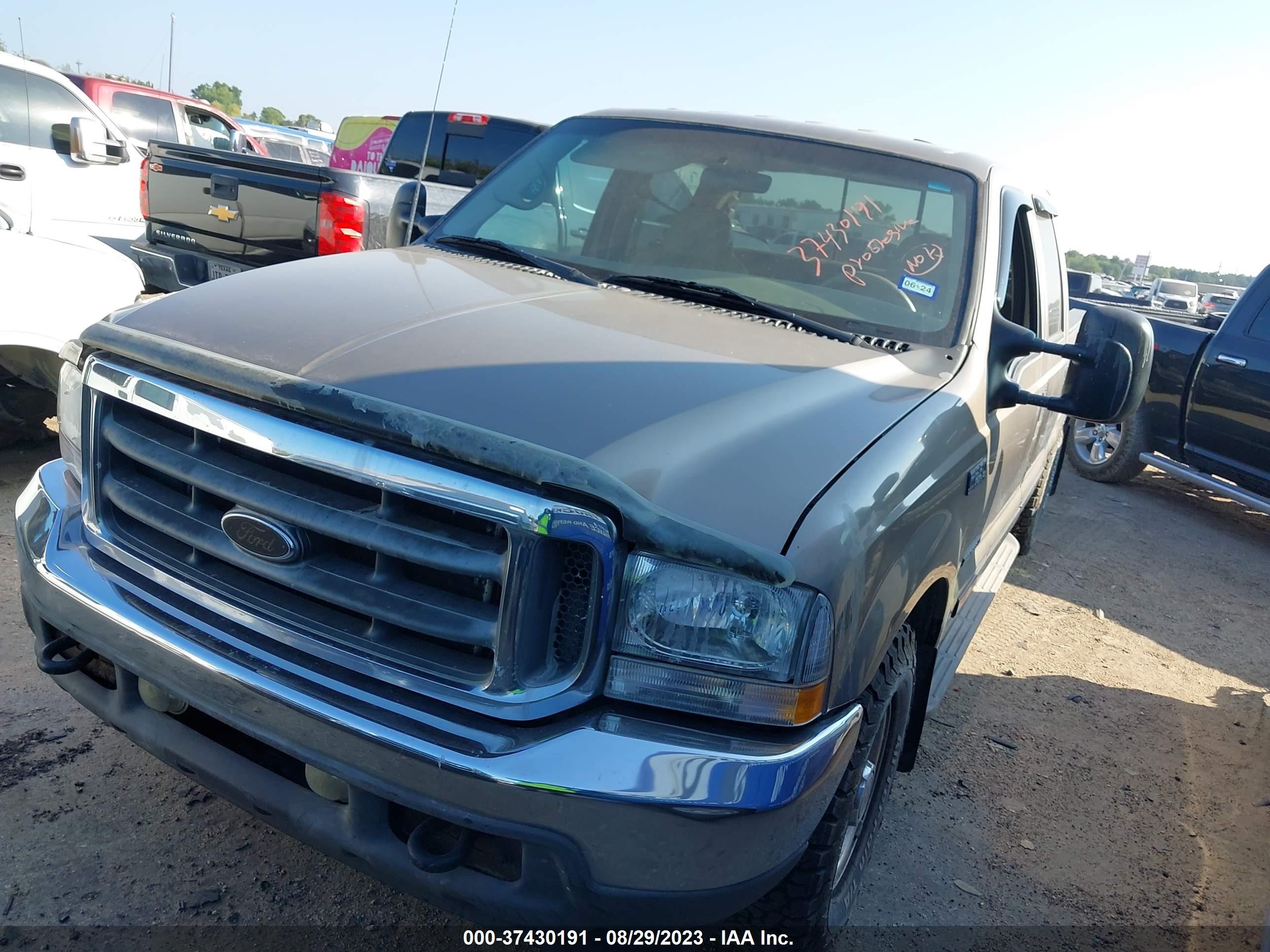 Photo 1 VIN: 1FTNW20F02EA07041 - FORD F250 