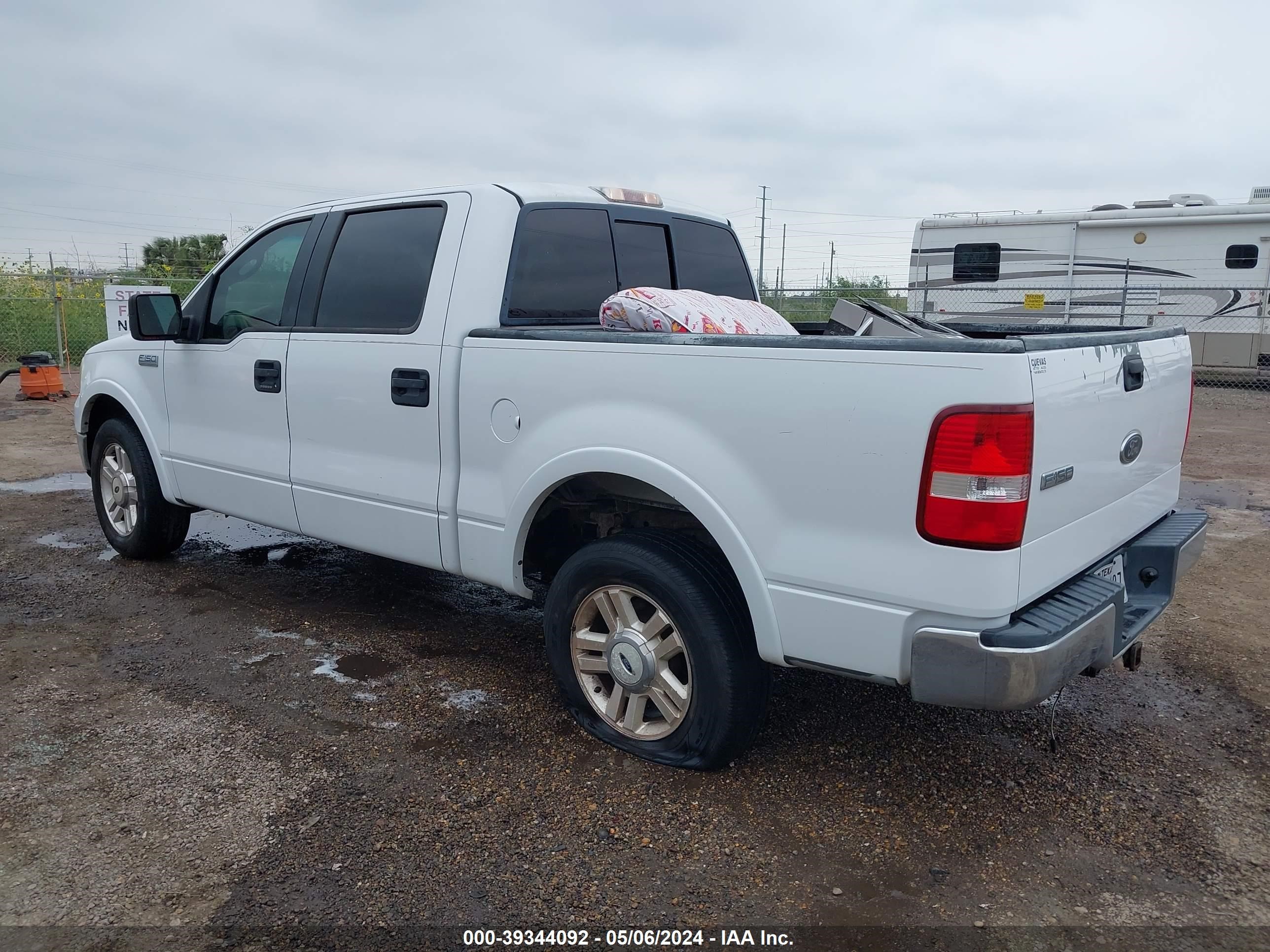 Photo 2 VIN: 1FTPW12584KD74345 - FORD F-150 