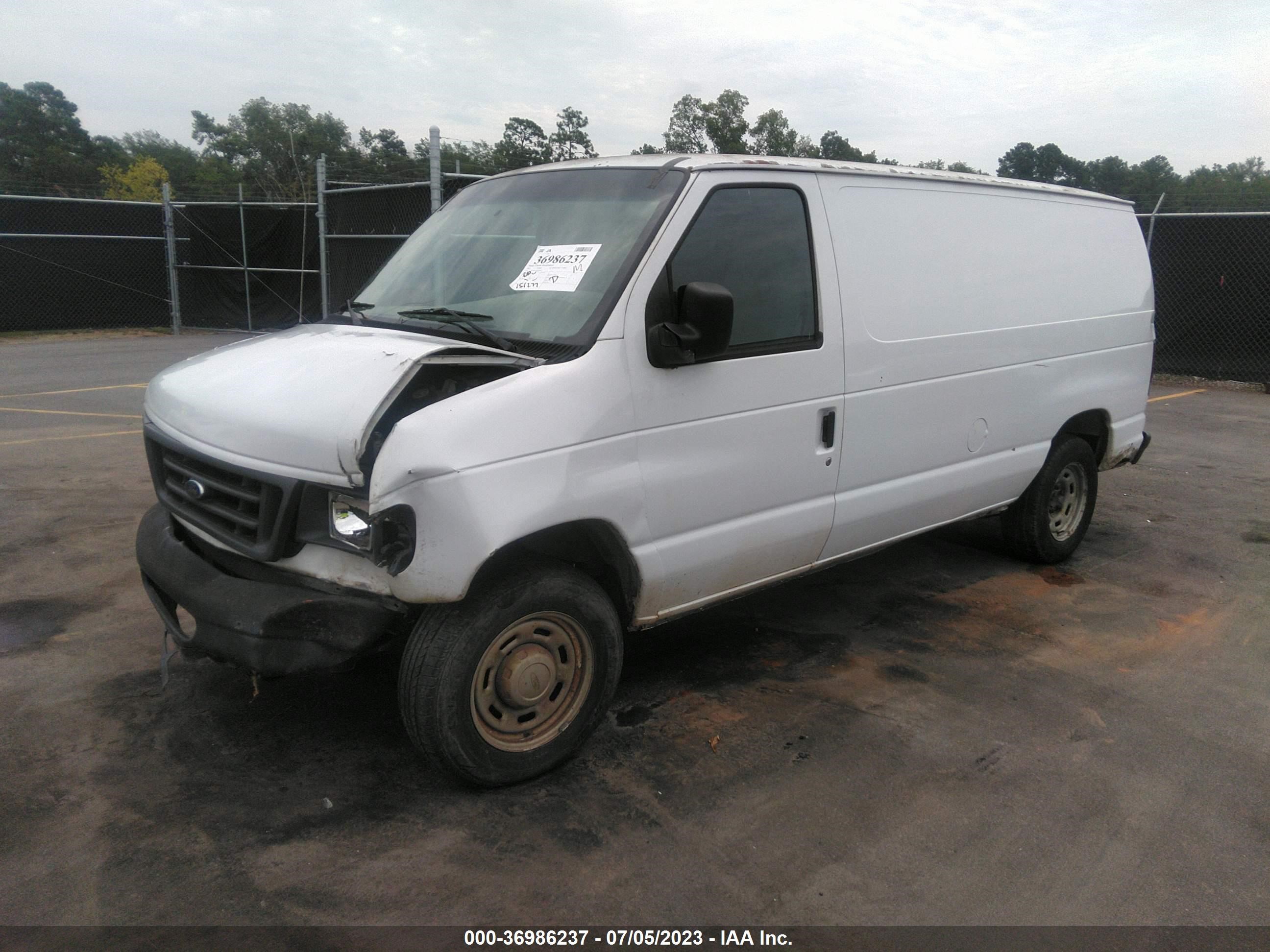 Photo 1 VIN: 1FTRE14W75HA89345 - FORD ECONOLINE 