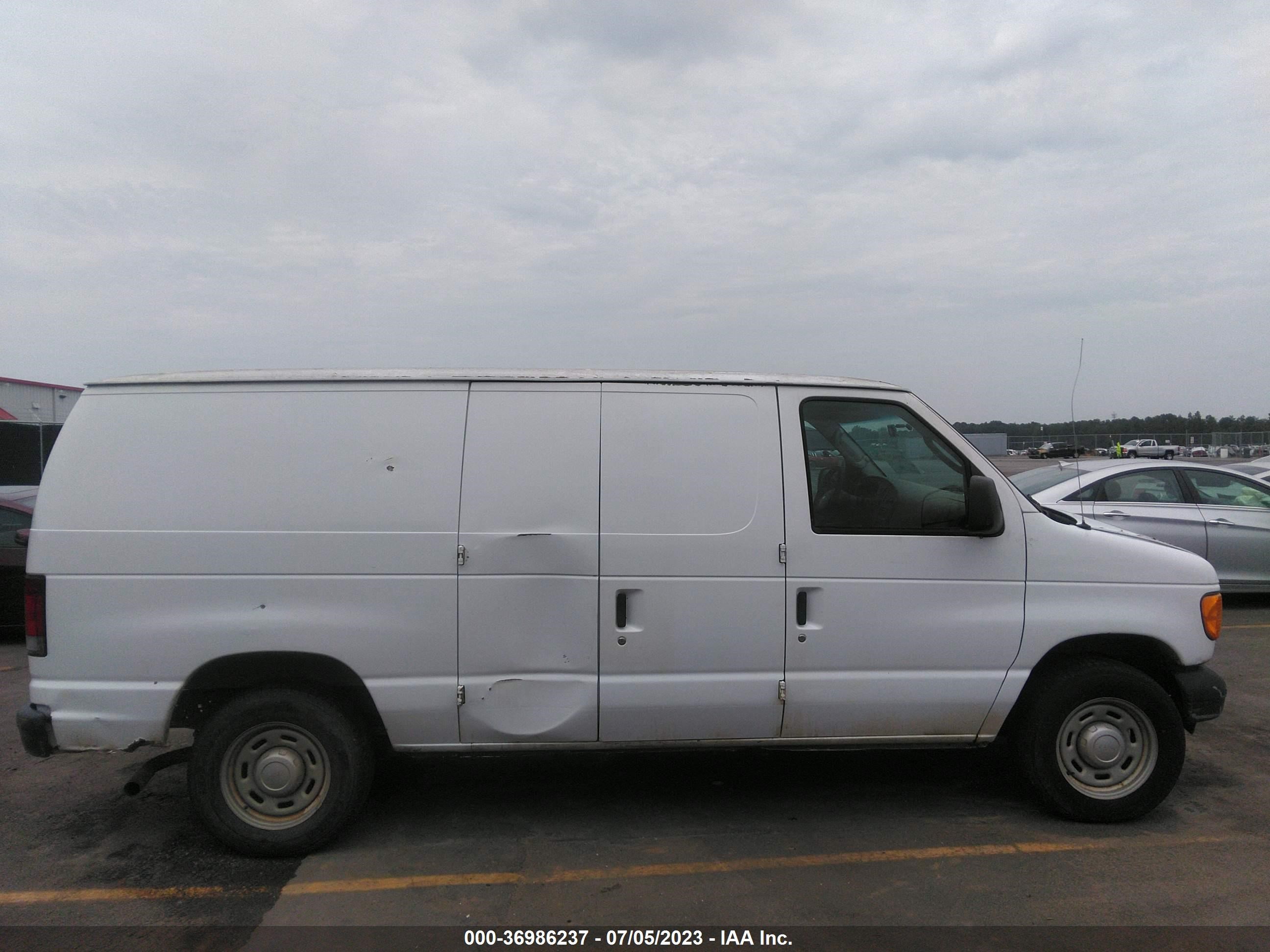 Photo 12 VIN: 1FTRE14W75HA89345 - FORD ECONOLINE 