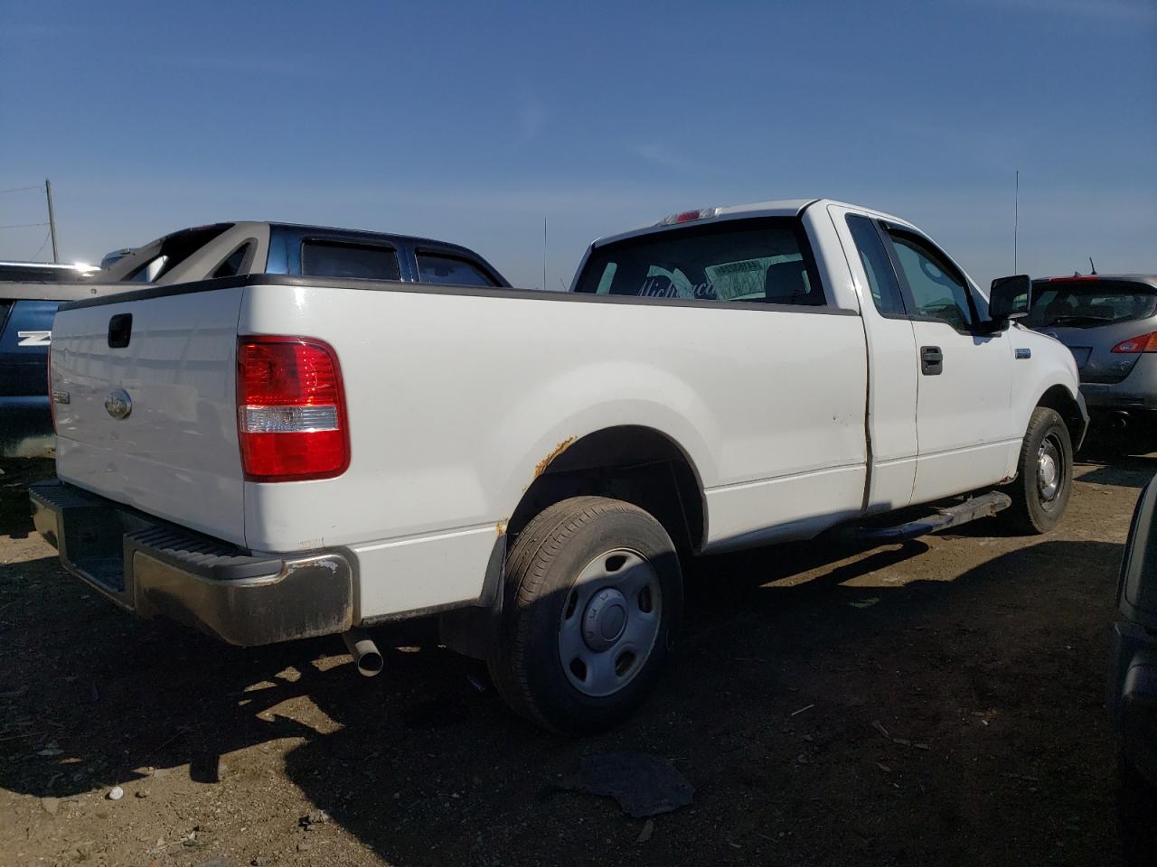 Photo 2 VIN: 1FTRF12227NA80392 - FORD F-150 