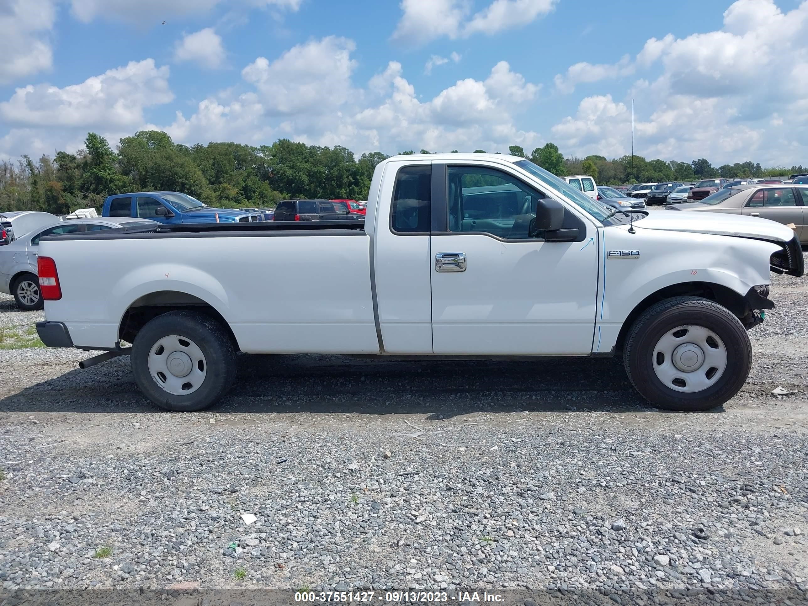 Photo 13 VIN: 1FTRF12247NA49743 - FORD F-150 