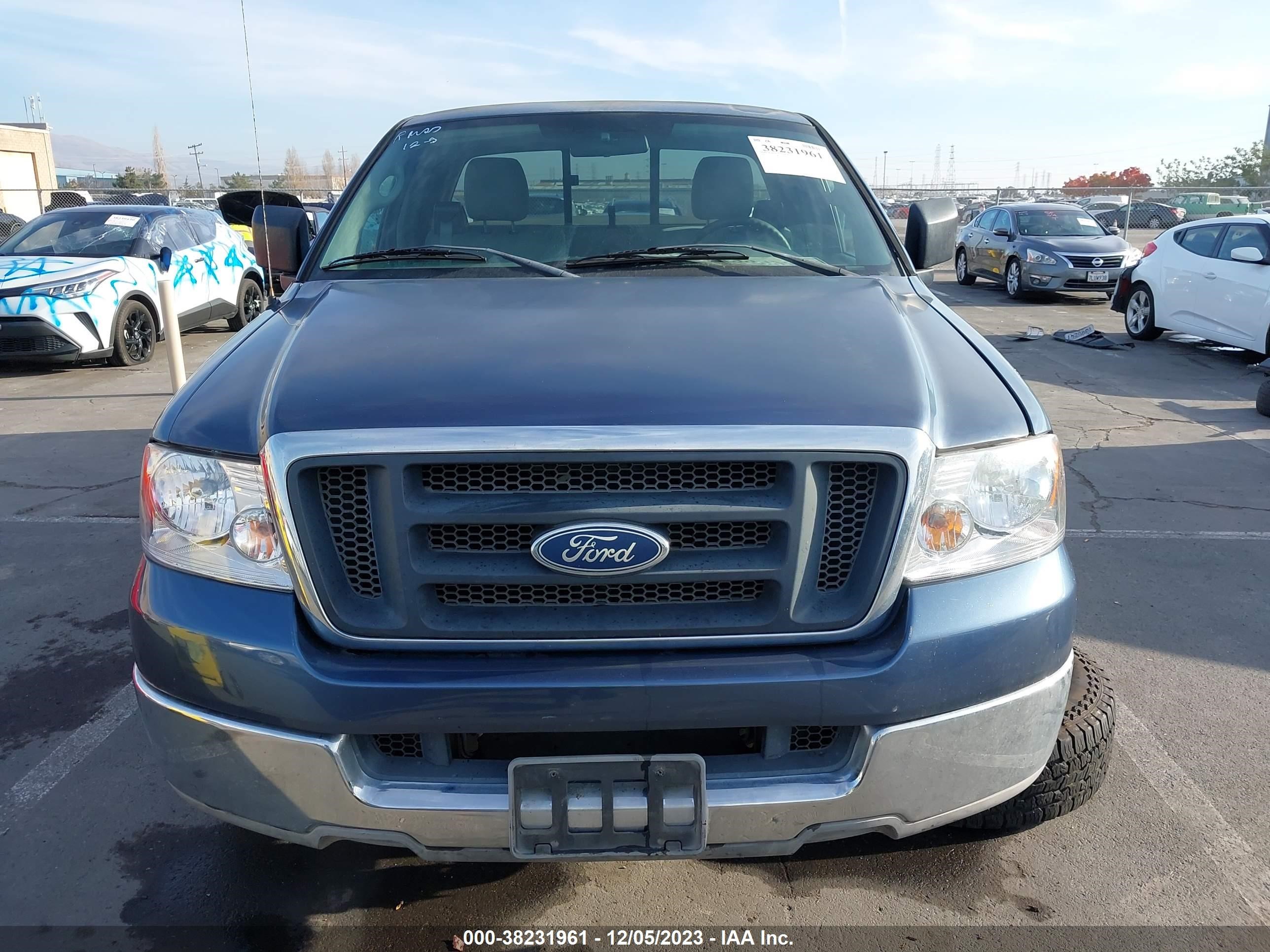 Photo 11 VIN: 1FTRF12W84NB81001 - FORD F-150 