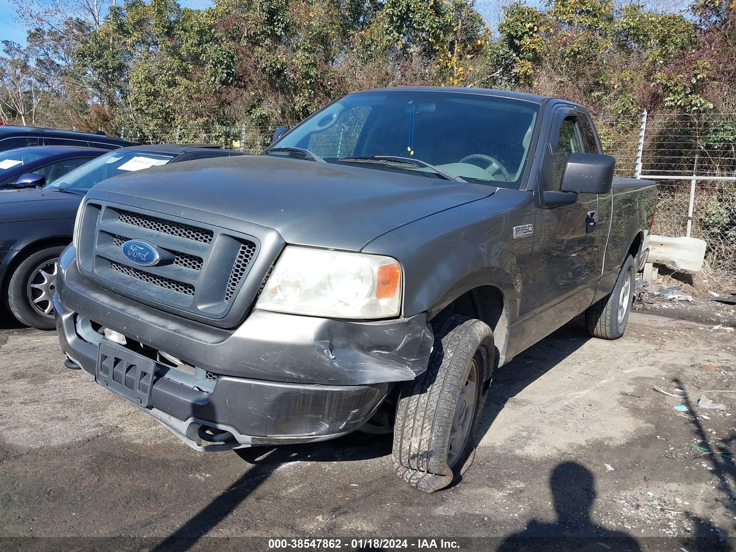 Photo 1 VIN: 1FTRF14W04NA01927 - FORD F-150 