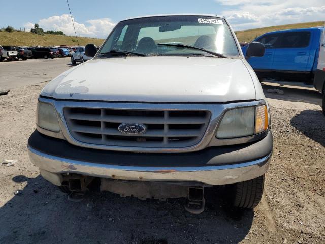 Photo 4 VIN: 1FTRF18L0YKA56207 - FORD F150 