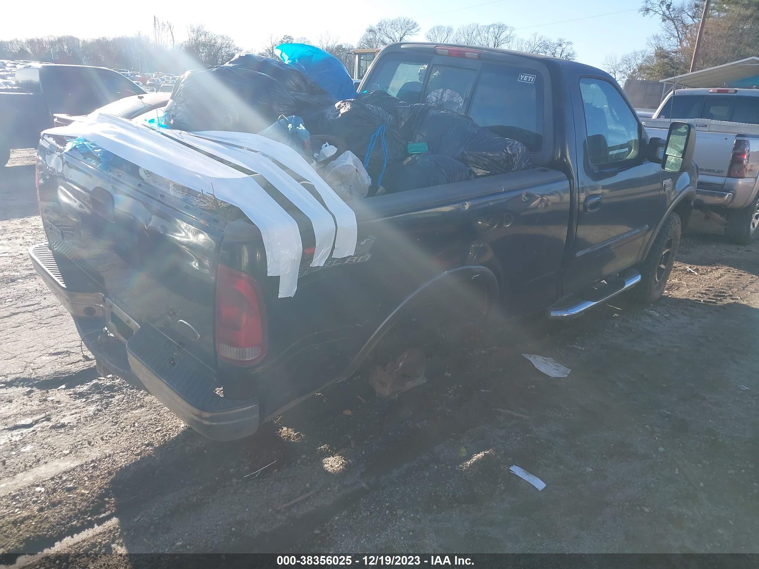 Photo 3 VIN: 1FTRF18W72NA97126 - FORD F-150 