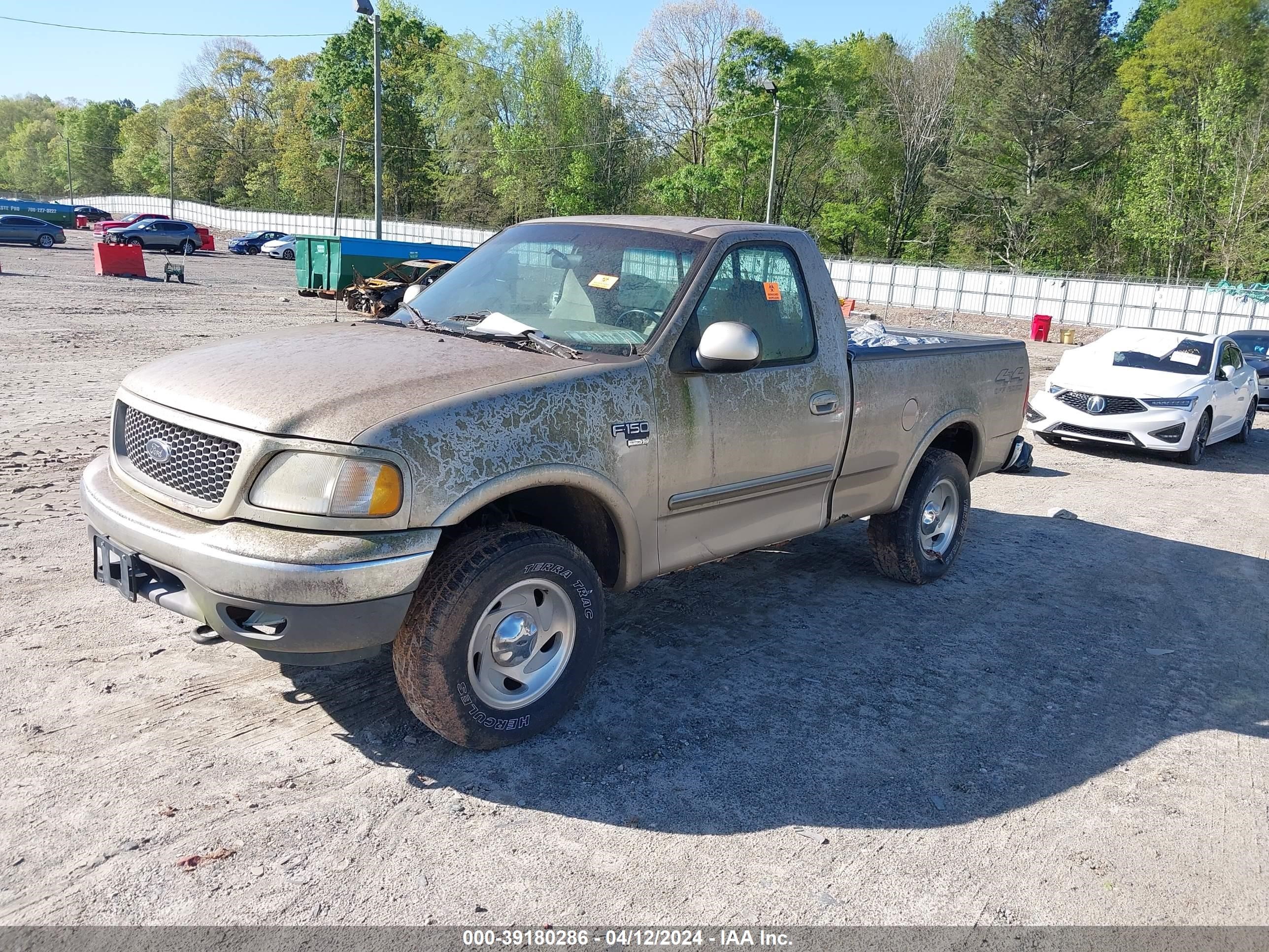 Photo 1 VIN: 1FTRF18W9YNC17386 - FORD F-150 