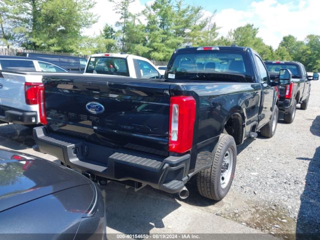 Photo 3 VIN: 1FTRF3AA5REE70426 - FORD F-350 