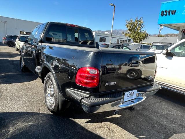 Photo 2 VIN: 1FTRX07L8YKA69876 - FORD F150 