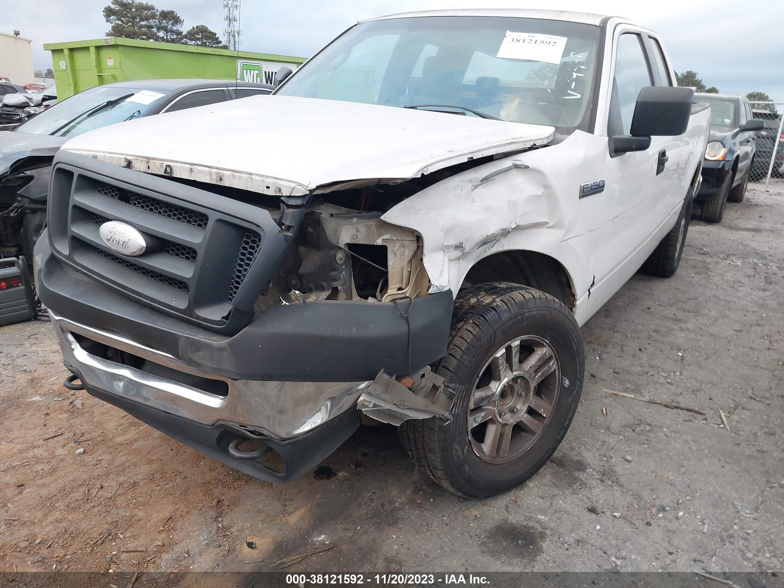 Photo 5 VIN: 1FTRX14W37FB89998 - FORD F-150 