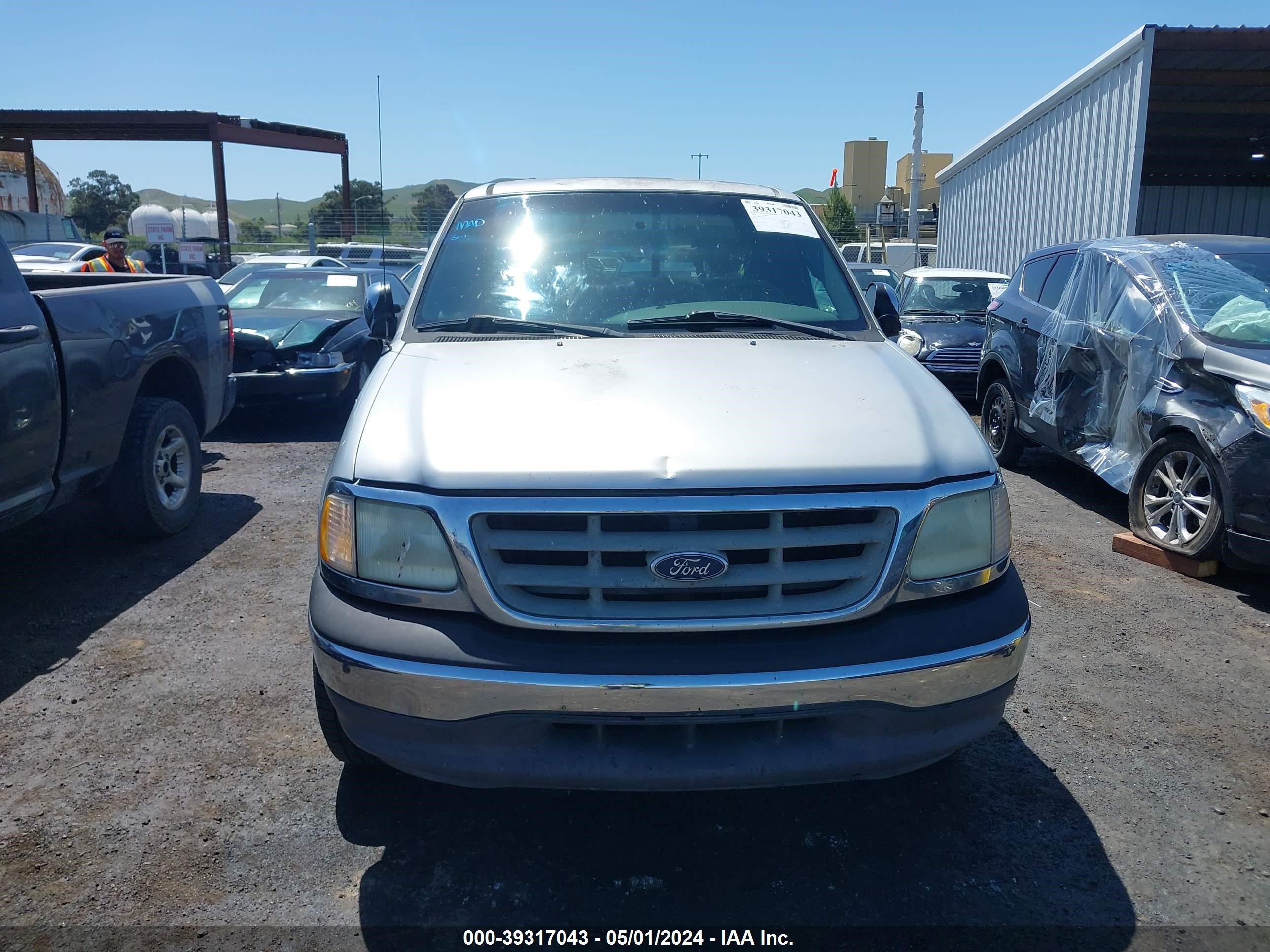 Photo 11 VIN: 1FTRX17212NA31361 - FORD F-150 