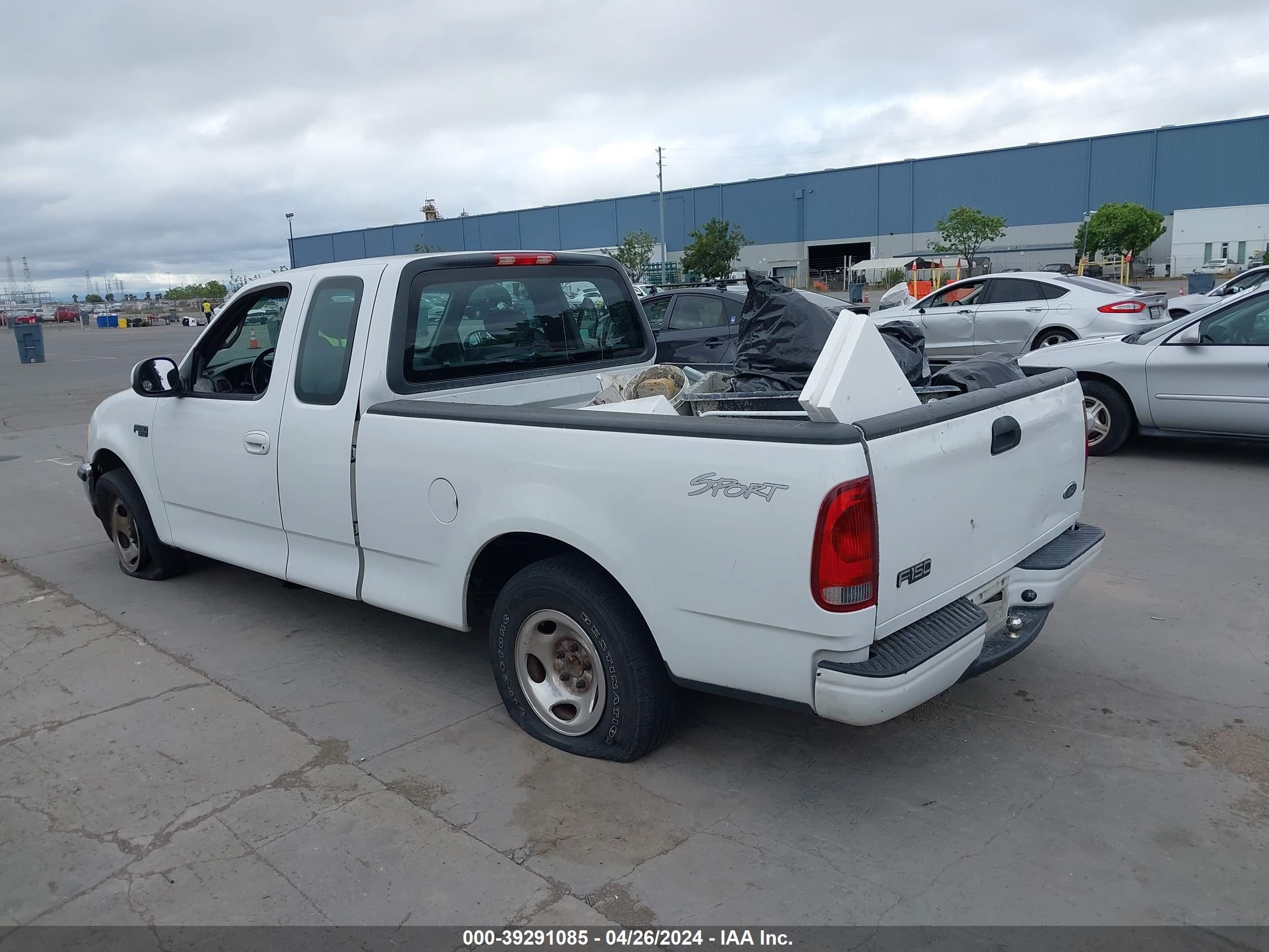 Photo 2 VIN: 1FTRX17252NA51869 - FORD F-150 