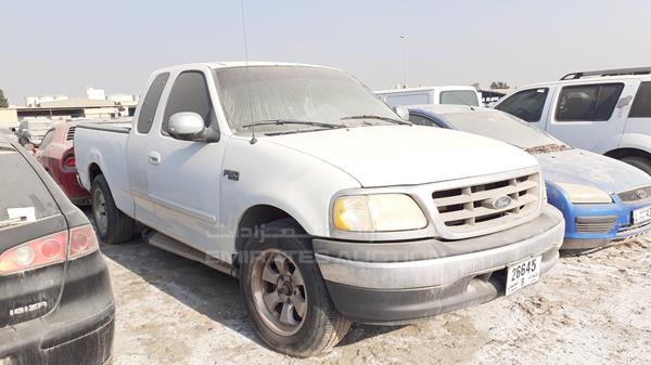 Photo 7 VIN: 1FTRX17W3YKA31729 - FORD F 150 