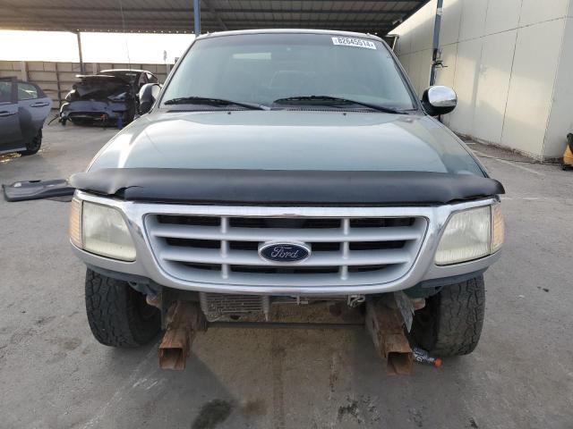 Photo 4 VIN: 1FTRX17W7XKC17451 - FORD F150 