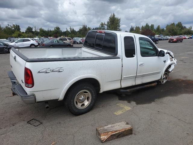 Photo 2 VIN: 1FTRX18L03NB69112 - FORD F150 