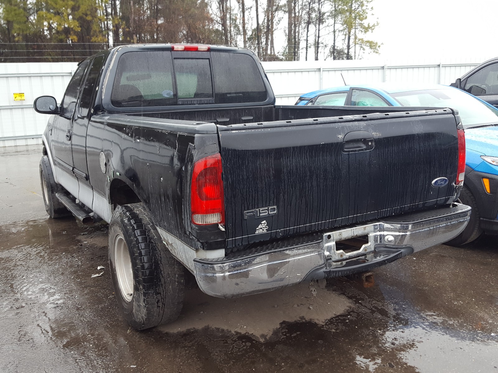 Photo 2 VIN: 1FTRX18L0XNB21552 - FORD F150 