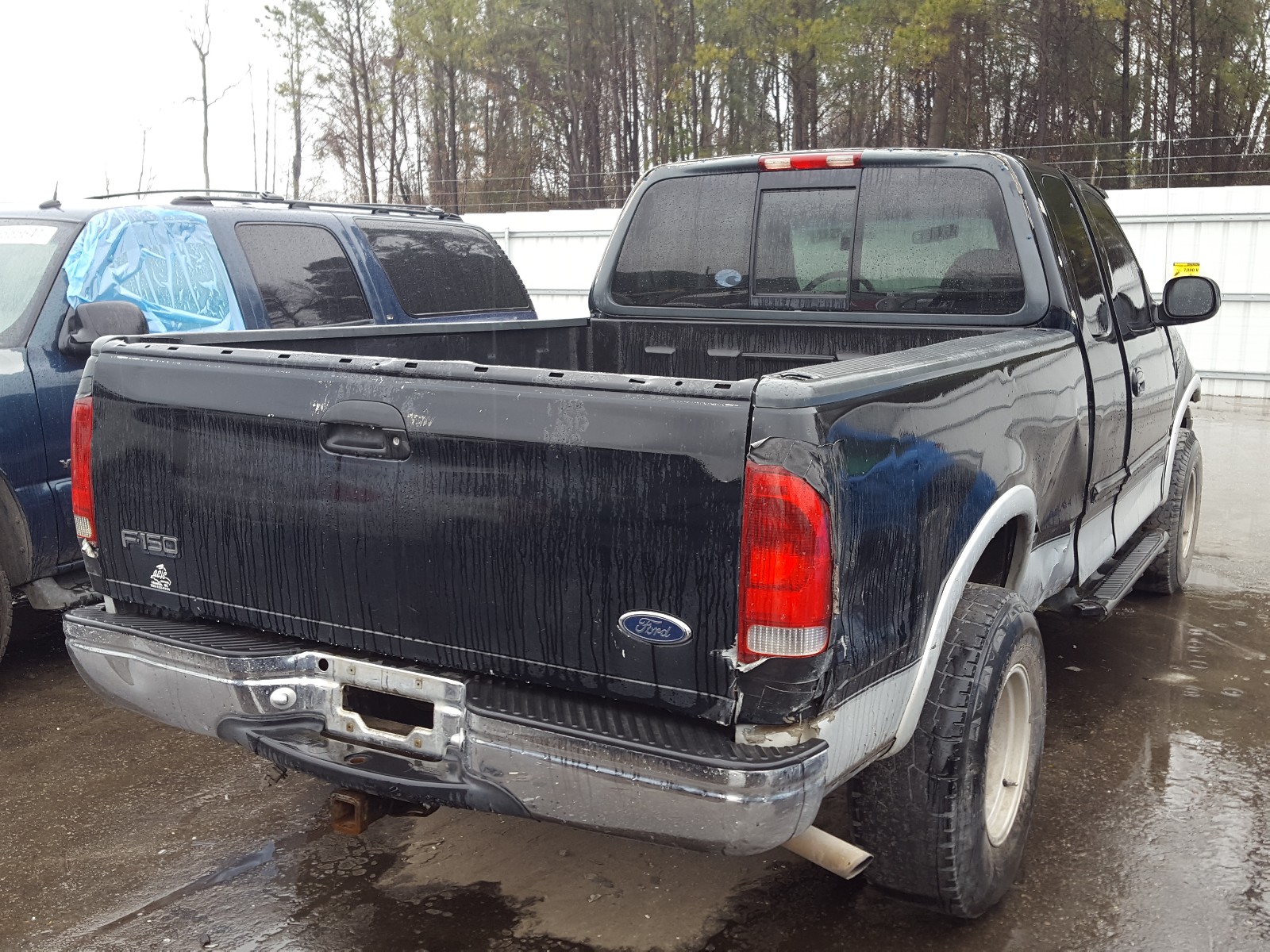 Photo 3 VIN: 1FTRX18L0XNB21552 - FORD F150 