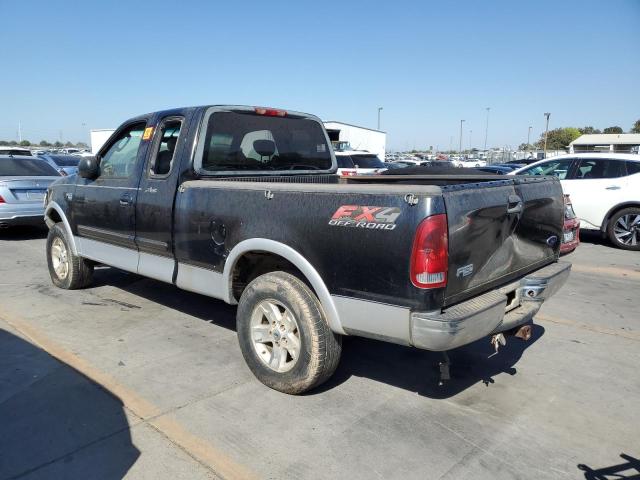 Photo 1 VIN: 1FTRX18L32NB36880 - FORD F150 