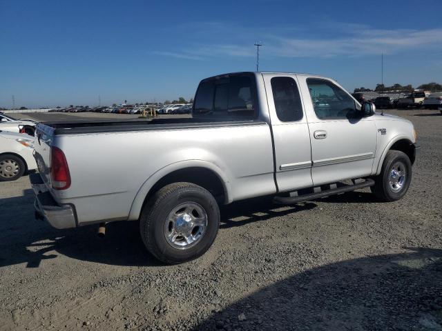 Photo 2 VIN: 1FTRX18L3XKB78667 - FORD F150 