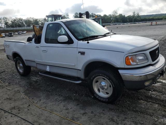 Photo 3 VIN: 1FTRX18L4YNB52062 - FORD F150 