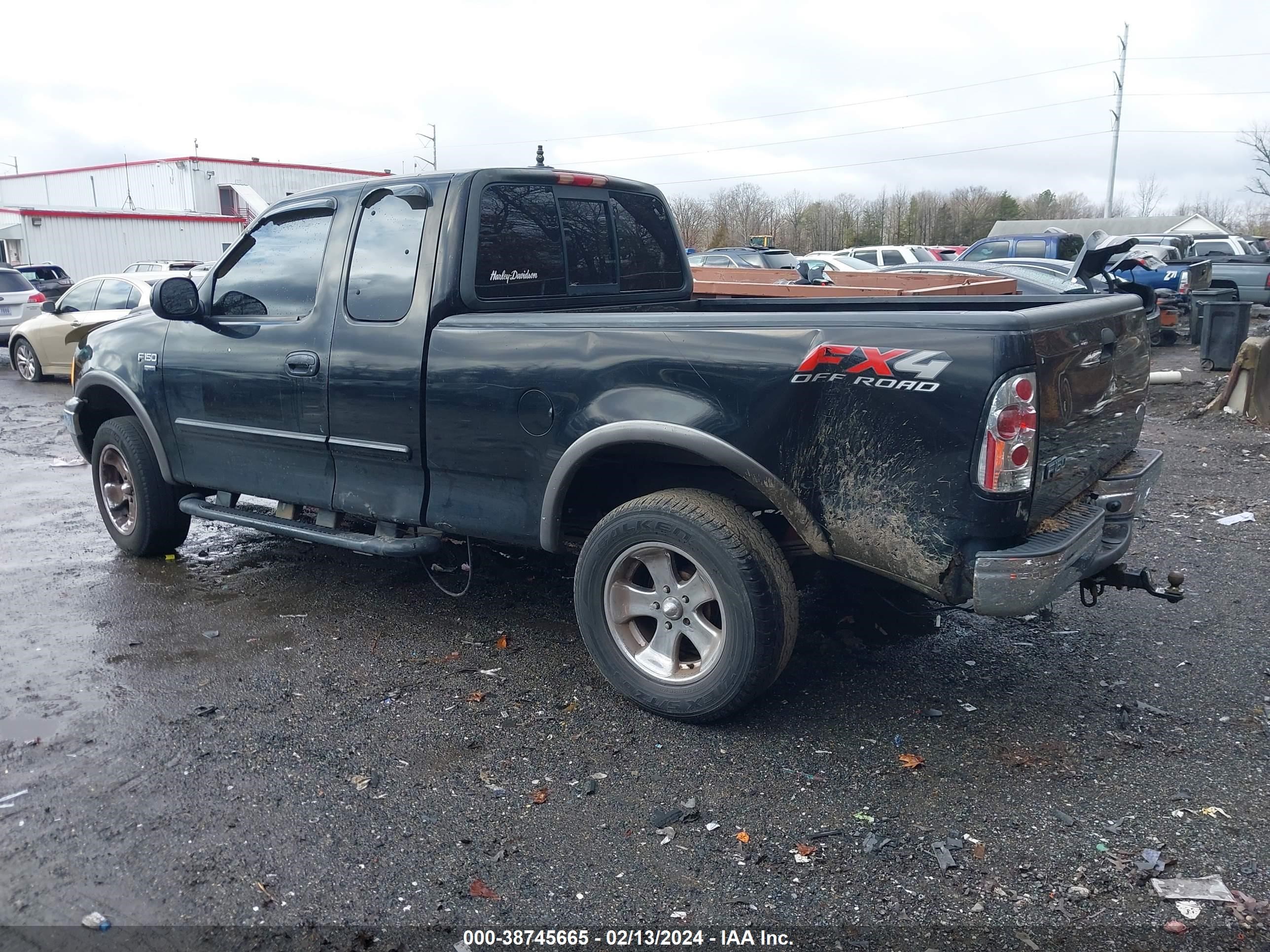 Photo 2 VIN: 1FTRX18L62NA07726 - FORD F-150 