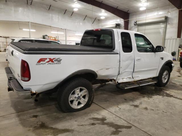 Photo 2 VIN: 1FTRX18L72NA35731 - FORD F150 