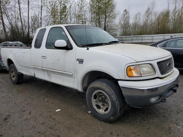 Photo 3 VIN: 1FTRX18L7YNB36583 - FORD F150 