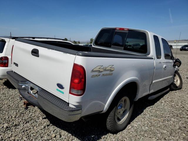 Photo 2 VIN: 1FTRX18L9YKA52038 - FORD F150 