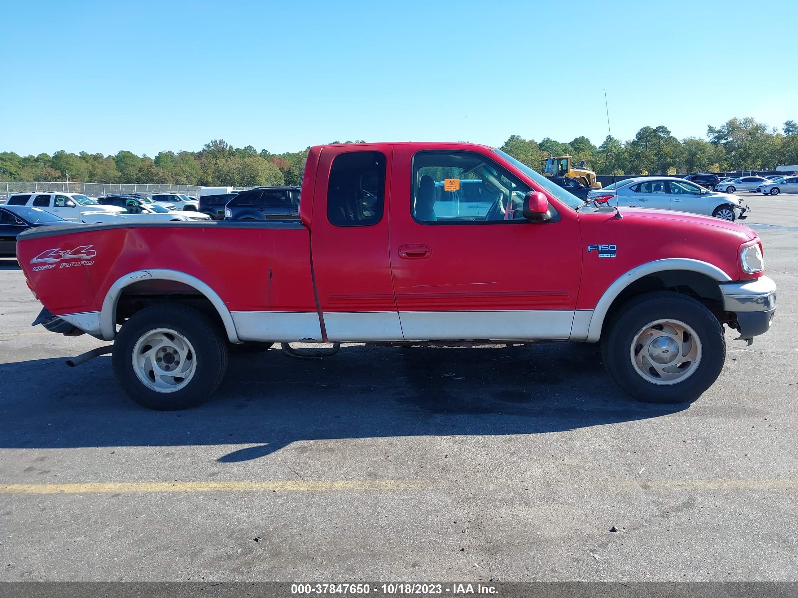 Photo 12 VIN: 1FTRX18L9YNB45608 - FORD F-150 