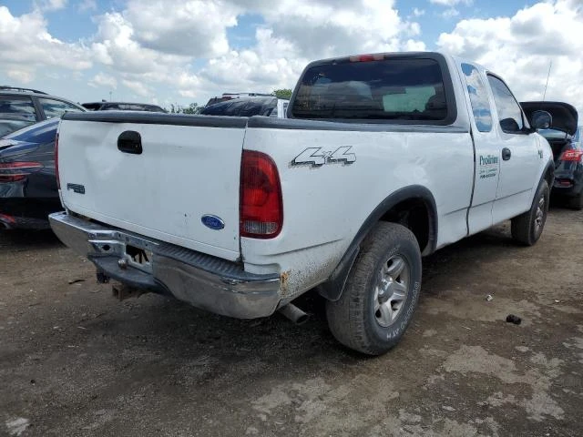 Photo 2 VIN: 1FTRX18W01NB32715 - FORD F150 