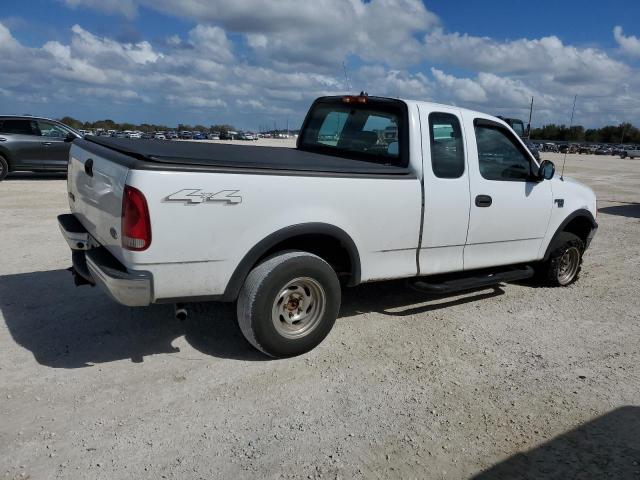 Photo 2 VIN: 1FTRX18W13NB50773 - FORD F150 