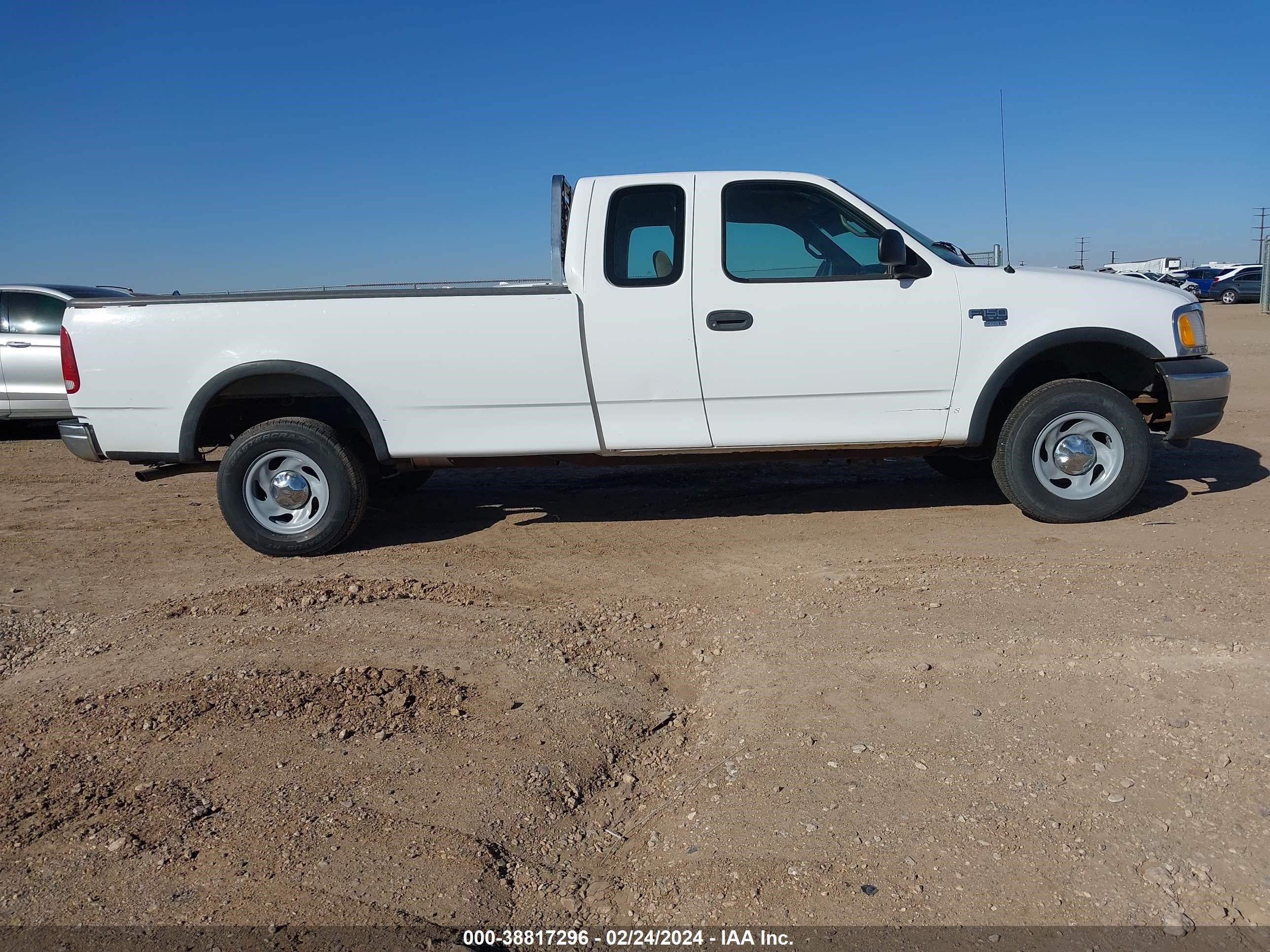 Photo 12 VIN: 1FTRX18W41NA20502 - FORD F-150 