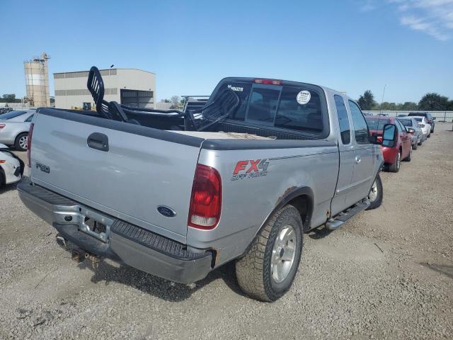 Photo 2 VIN: 1FTRX18W42NA87201 - FORD F150 