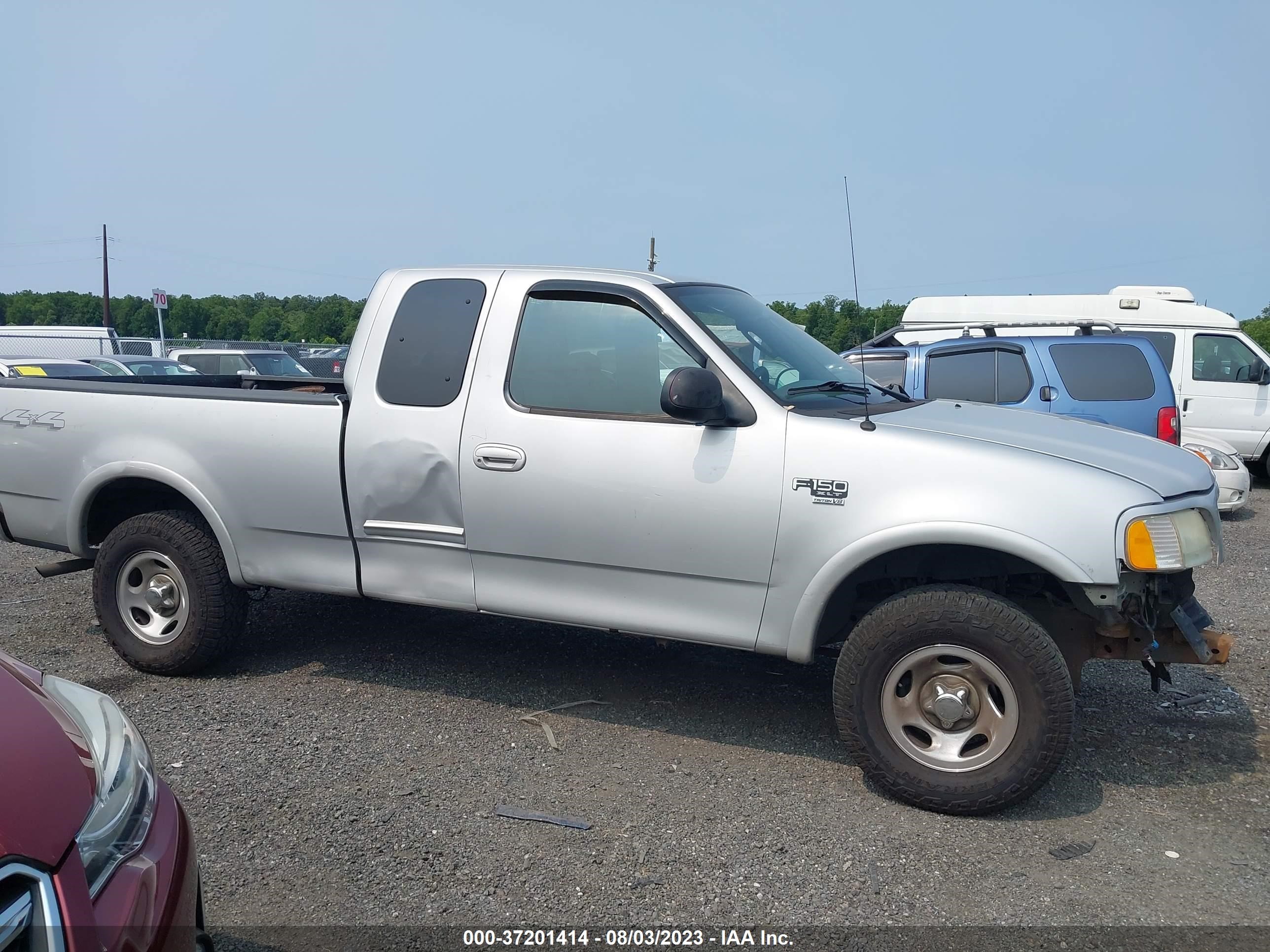 Photo 12 VIN: 1FTRX18W43NA74837 - FORD F-150 