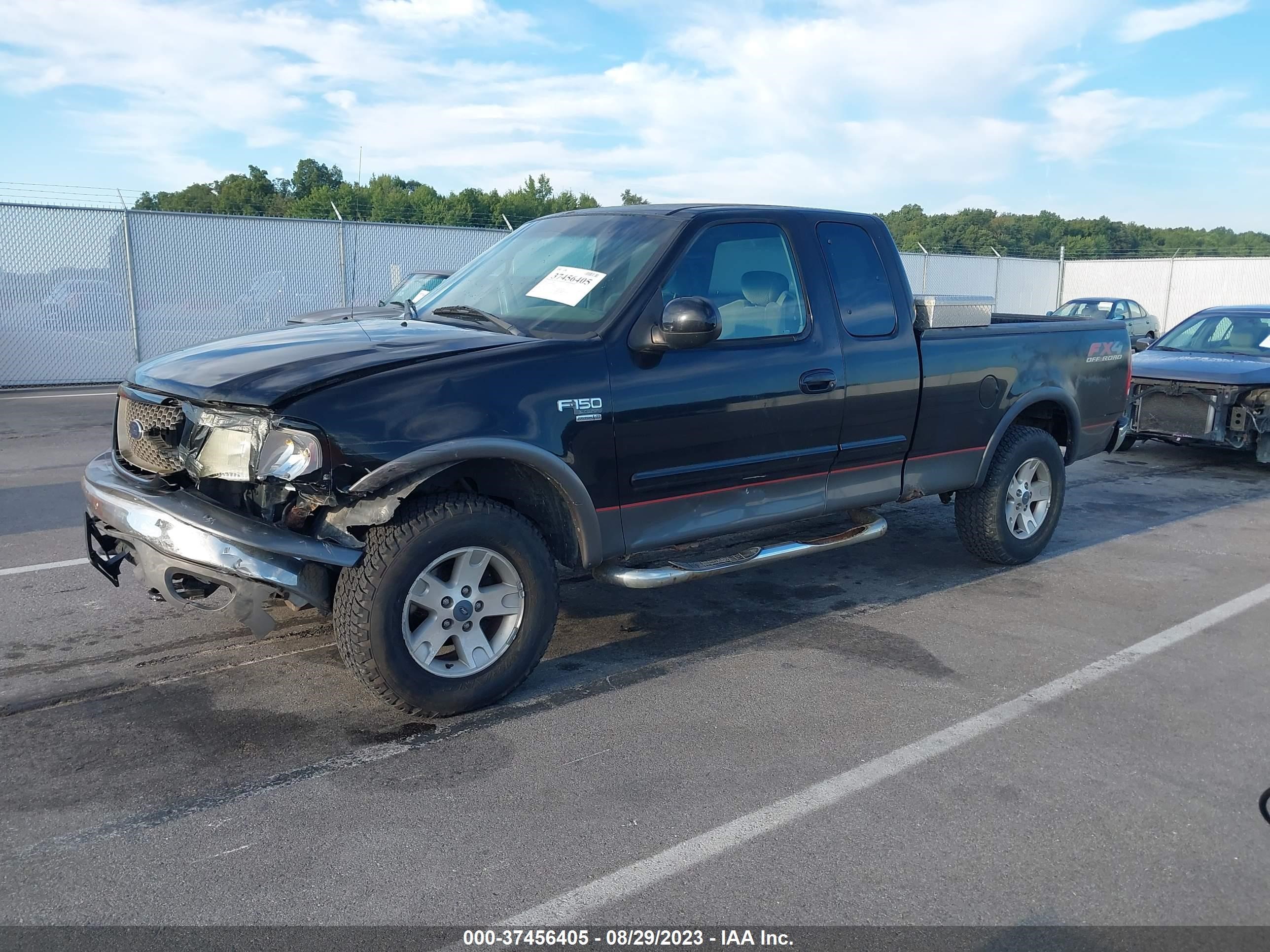 Photo 1 VIN: 1FTRX18W92NA96010 - FORD F-150 