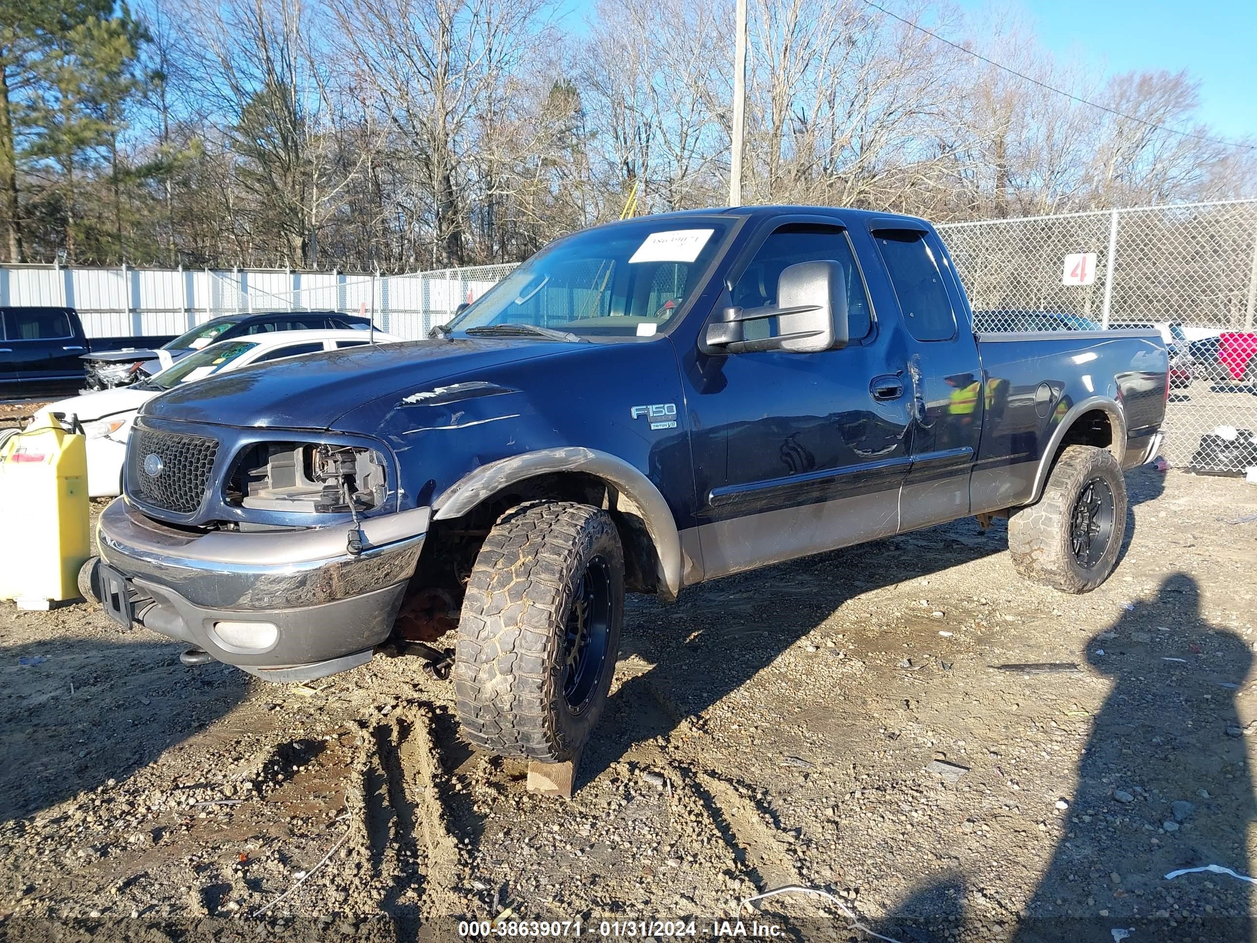 Photo 1 VIN: 1FTRX18W92NB30947 - FORD F-150 