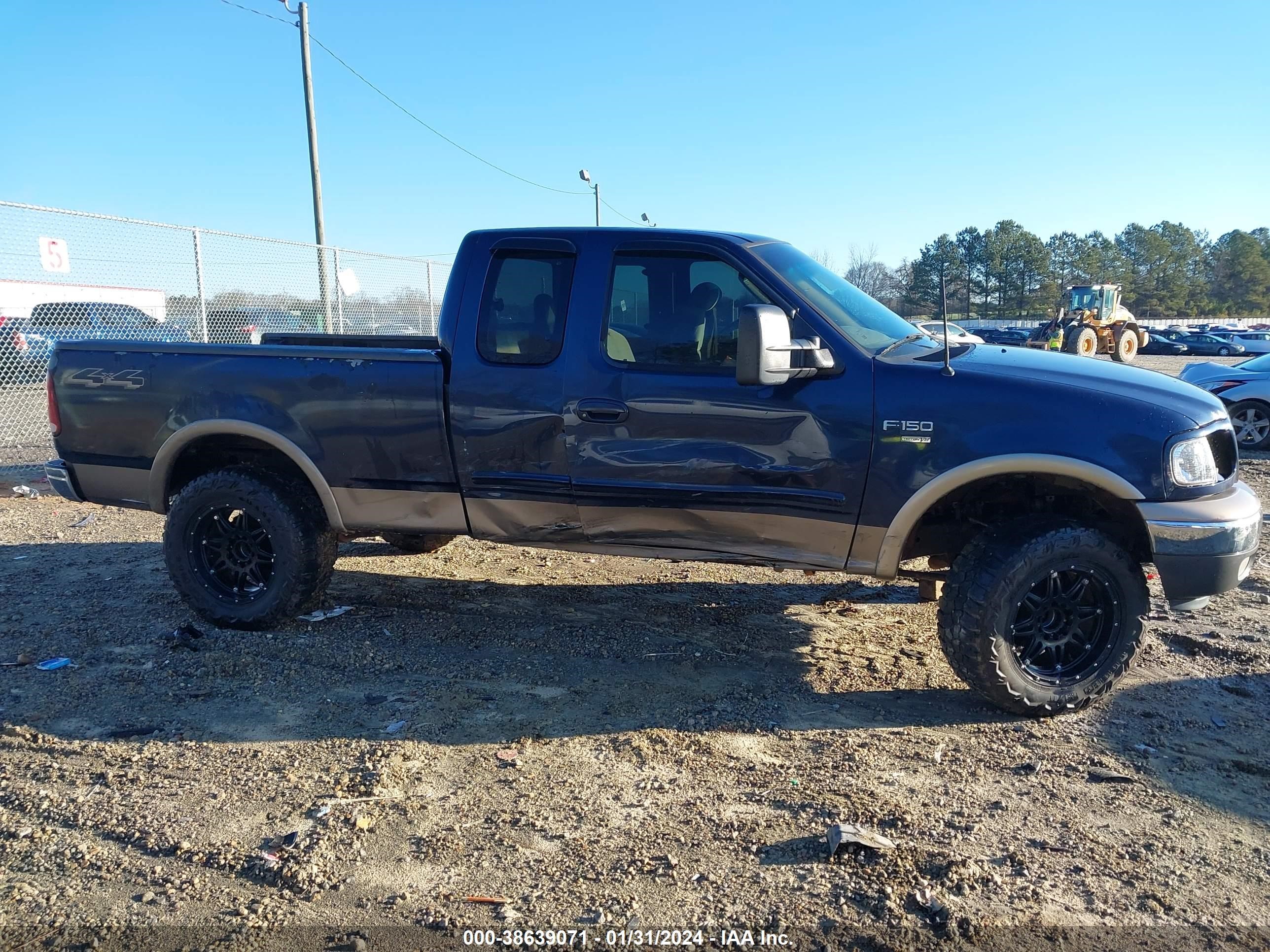 Photo 11 VIN: 1FTRX18W92NB30947 - FORD F-150 