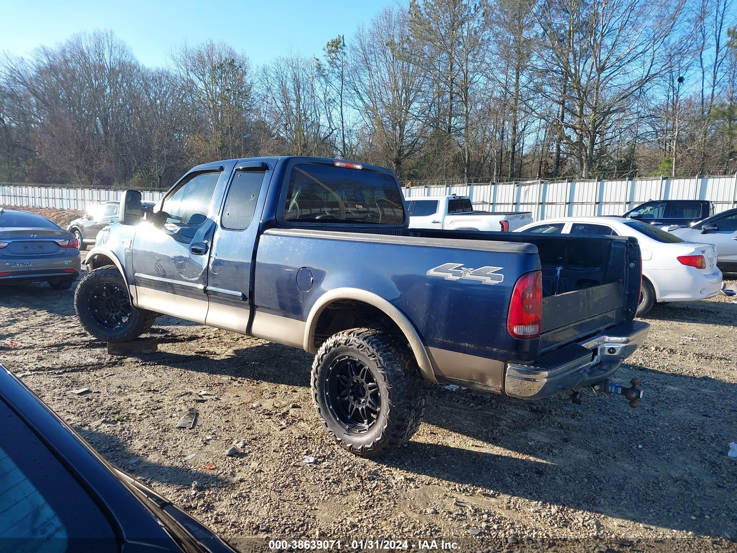 Photo 2 VIN: 1FTRX18W92NB30947 - FORD F-150 