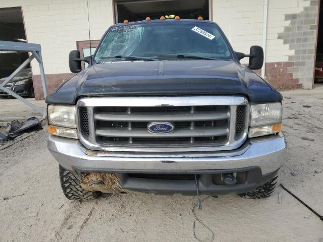 Photo 4 VIN: 1FTSW31F0XEA69733 - FORD F350 