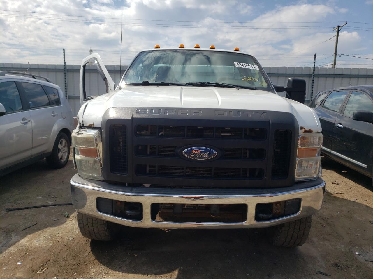 Photo 4 VIN: 1FTWF3B5XAEA44093 - FORD F350 