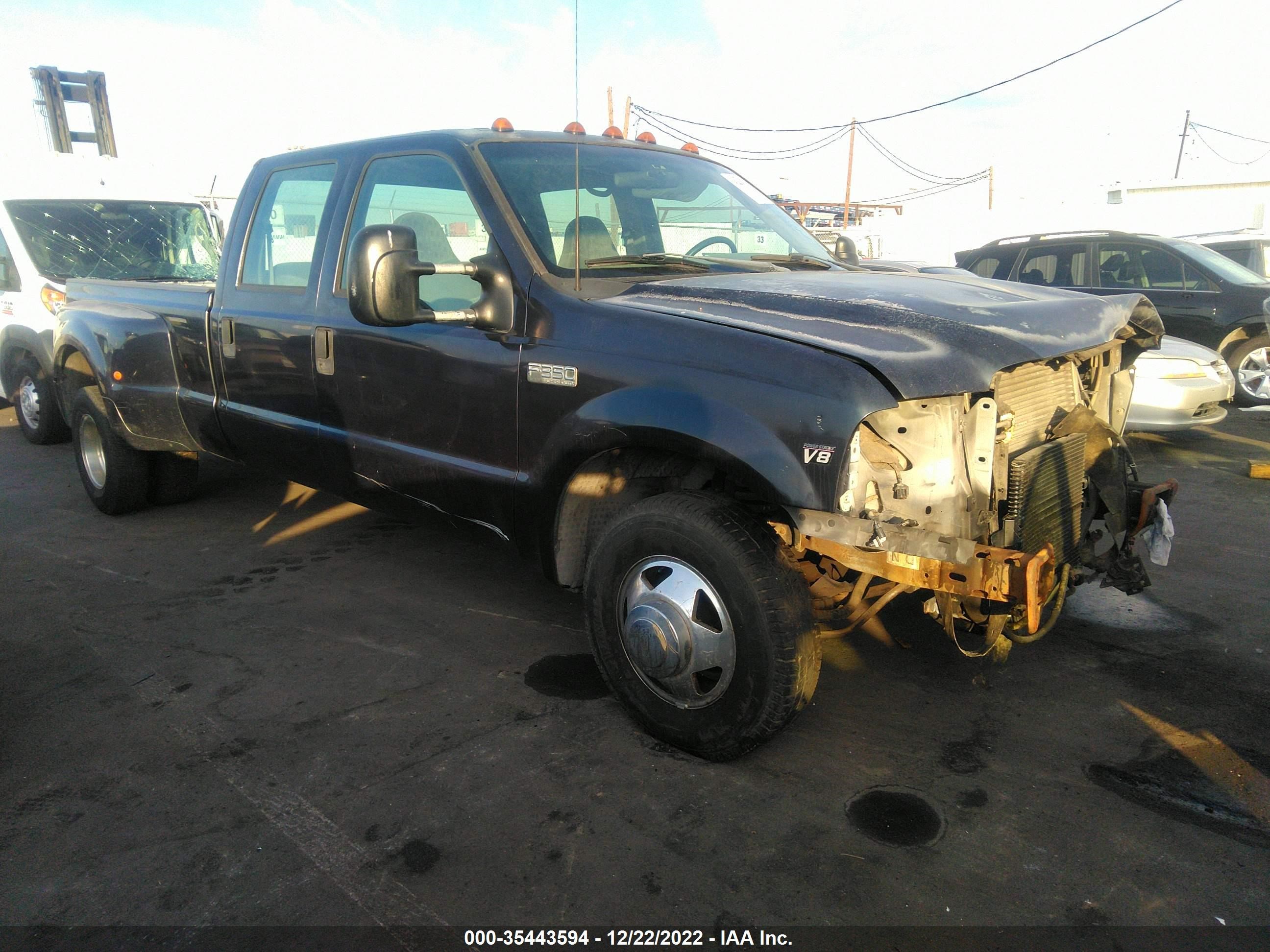 Photo 1 VIN: 1FTWW32F1XEB77455 - FORD F350 