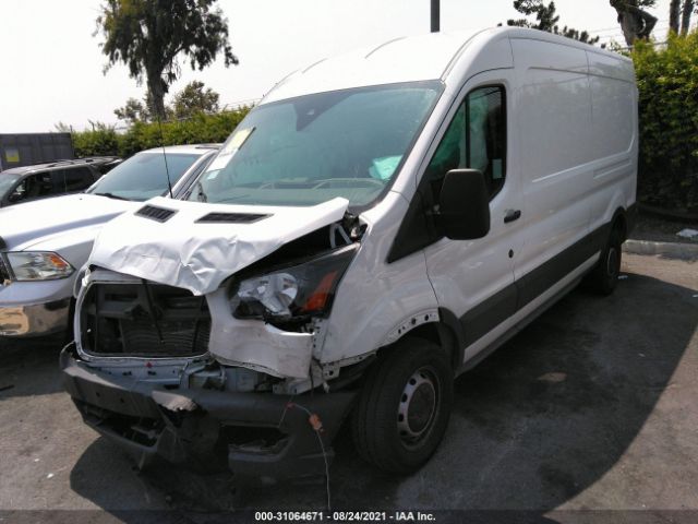 Photo 1 VIN: 1FTYE1C84LKA59363 - FORD TRANSIT CARGO VAN 