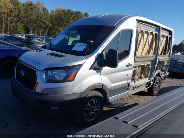 Photo 1 VIN: 1FTYE1C84NKA04513 - FORD TRANSIT-150 CARGO VAN 